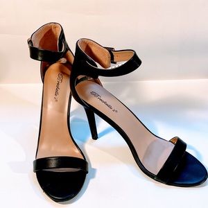 Black ankle strap stiletto heel